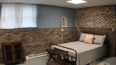 Garden Level Suite at the Historic McCoy House – Private Entrance & Deck Access