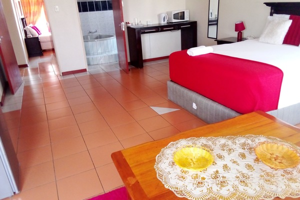 Superior Suite, Pool View | Desk, laptop workspace