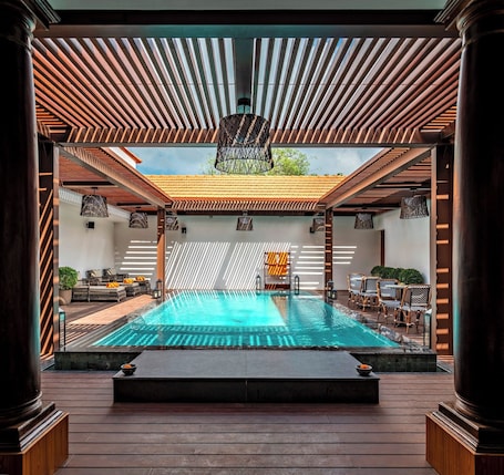 Outdoor pool. THE Lotus Palace Chettinad
