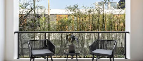 Superior Apartment | Living area | Flat-screen TV