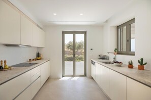 Villa | Private kitchen | Full-size fridge, microwave, oven, stovetop