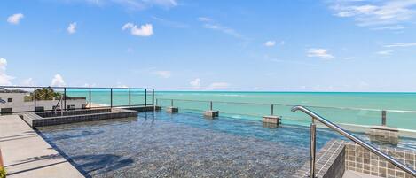 Outdoor pool, open 6:00 AM to 10:00 PM, pool umbrellas, sun loungers