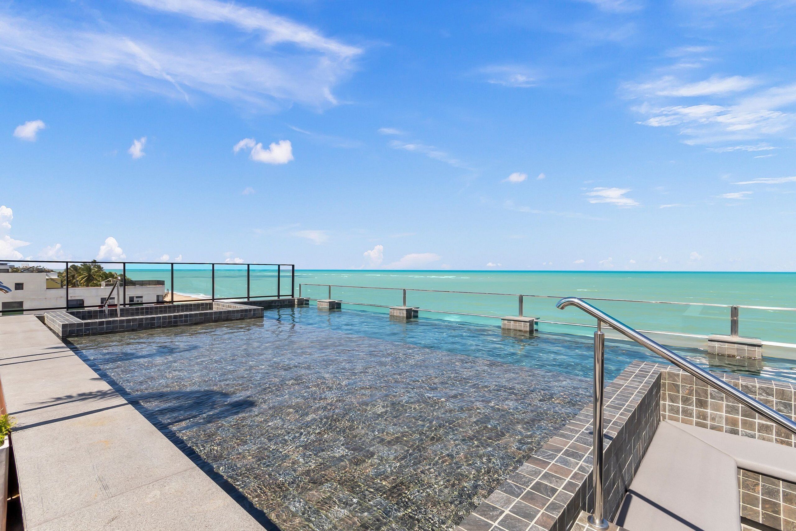 Outdoor pool, open 6:00 AM to 10:00 PM, pool umbrellas, pool loungers