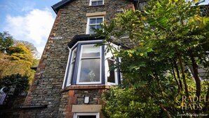 A stone building with a bay window and a sign reading "FERRY VIEW". - Fair Rigg by Cradel Haus (Windermere)
