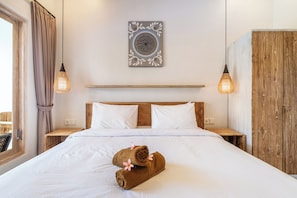Apartment, 1 Queen Bed, Kitchen | 1 bedroom, desk, laptop workspace, soundproofing - Aura Apartments Ubud (Ubud)