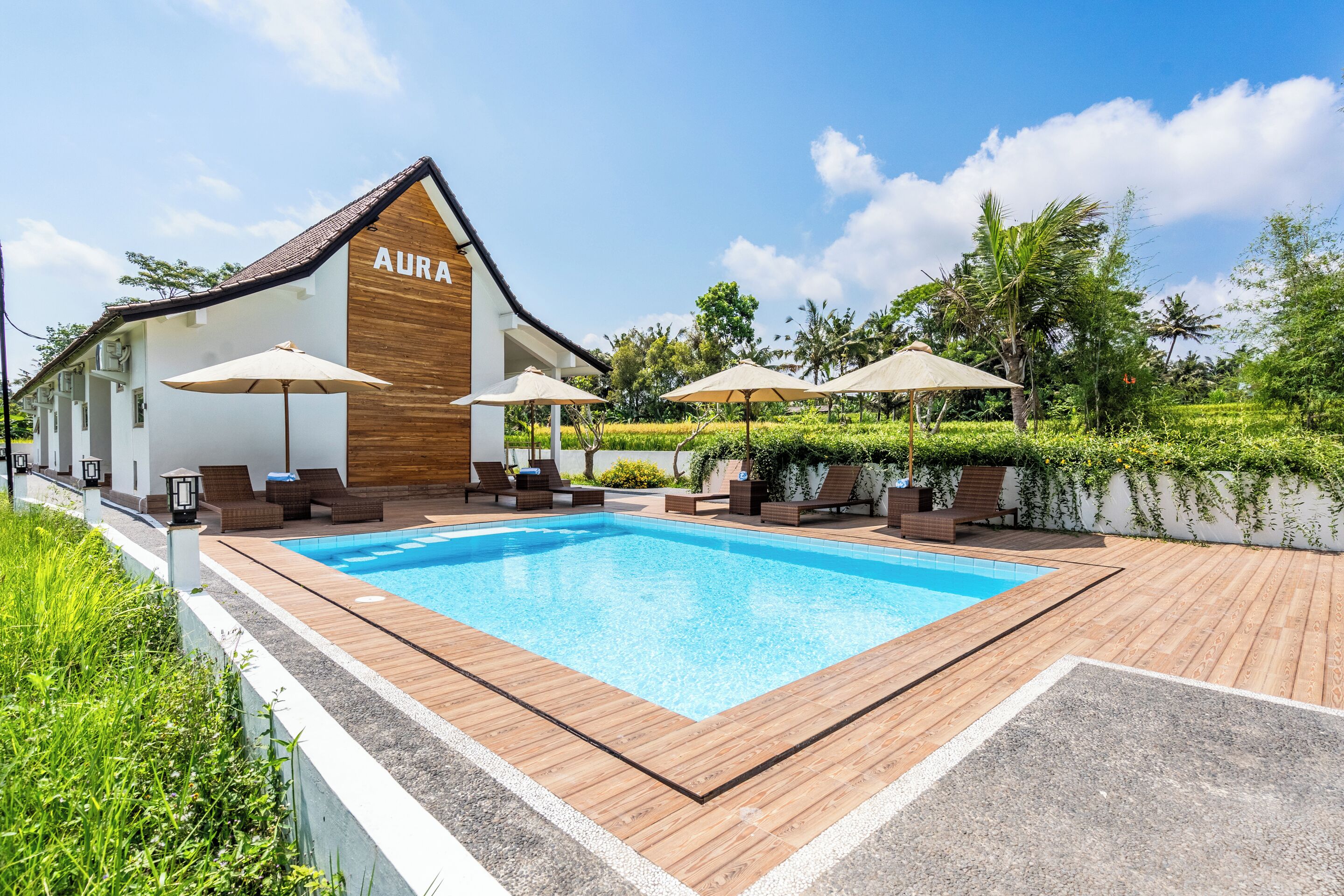 Outdoor pool, pool umbrellas, sun loungers
