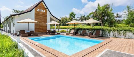 Outdoor pool, pool umbrellas, pool loungers