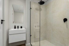 Shower, hair dryer, towels, soap - Designer Sea Point Apartment | Balcony with View (Cape Town)