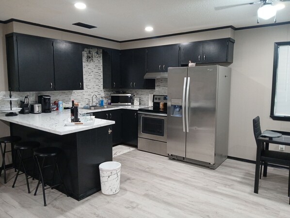 Fridge, microwave, oven, stovetop