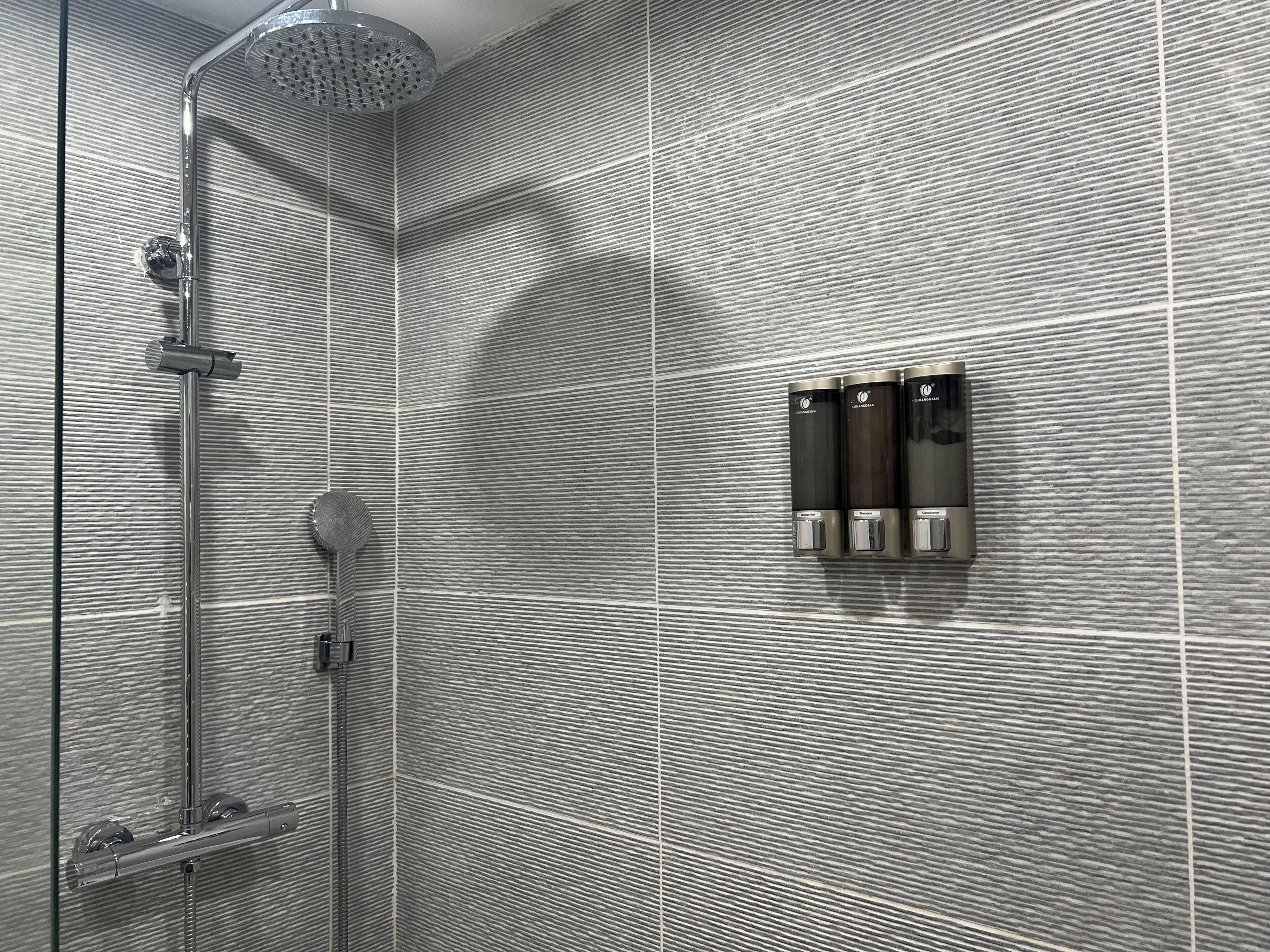 Hair dryer, towels, soap, shampoo