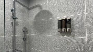 Hair dryer, towels, soap, shampoo