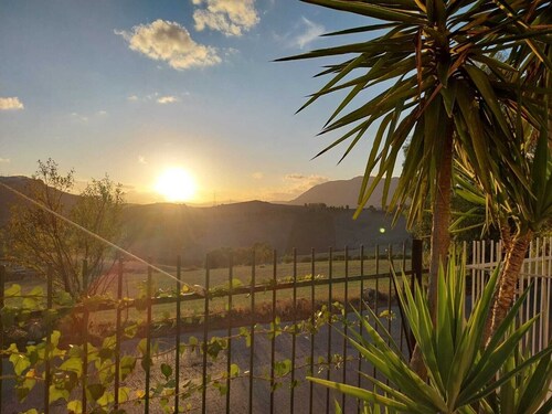 Relaxation villa surrounded by greenery with outdoor pool, sauna and whirlpool.