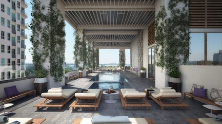 Outdoor pool, open 7:00 AM to 7:00 PM, sun loungers