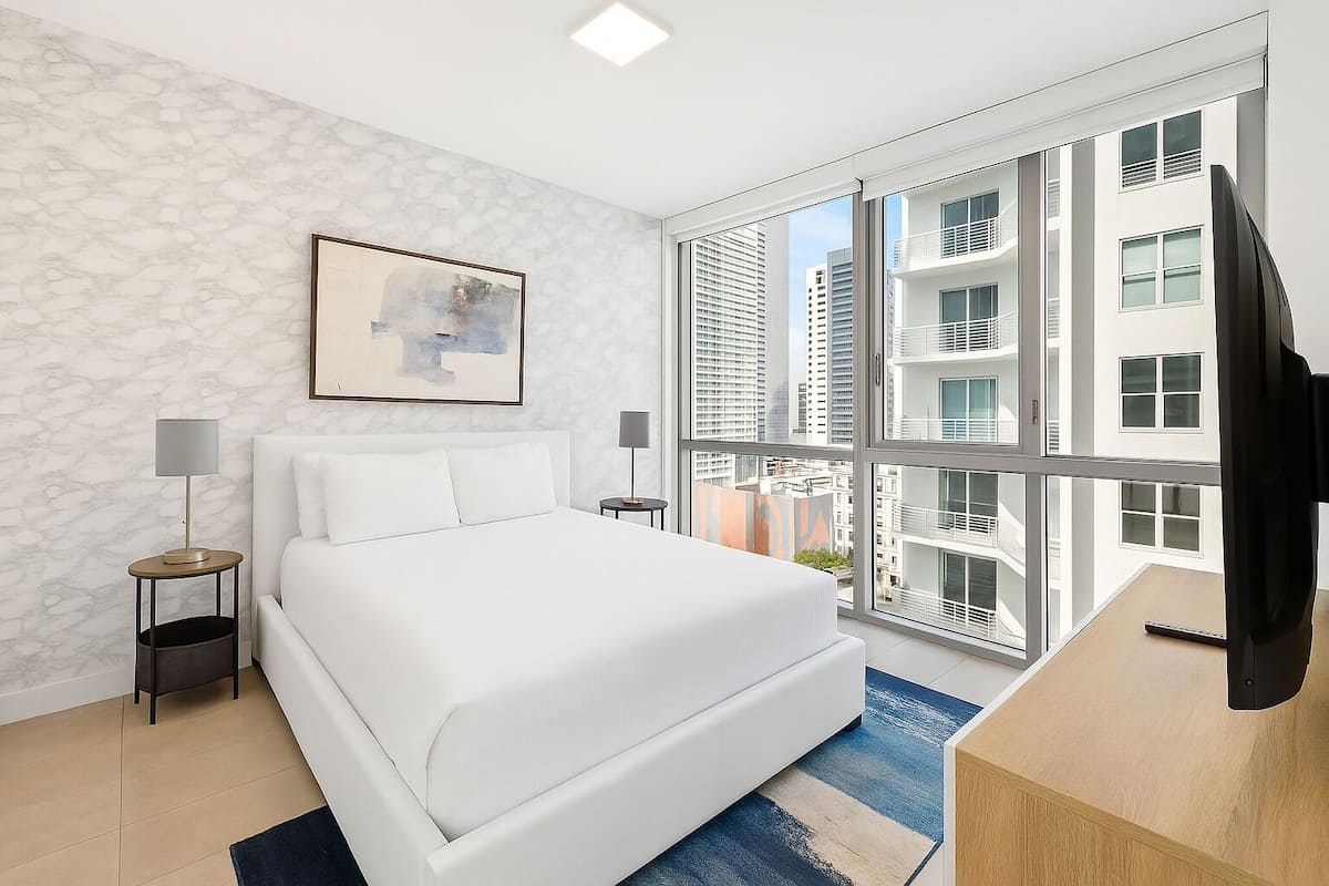 Panoramic Condo, 1 Bedroom, Balcony, City View | 1 bedroom, Egyptian cotton sheets, premium bedding, down comforters