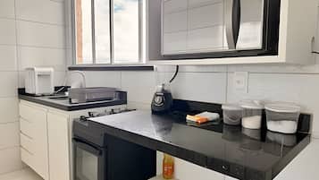 Panoramic Suite | Private kitchen | Fridge, microwave, dining tables