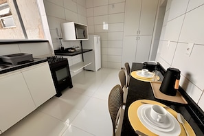 Fridge, microwave, dining tables