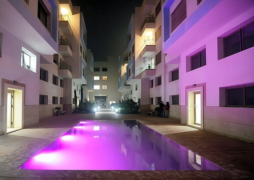 Cozy, luxurious apartment with a pool, elevator, and the beach nearby...