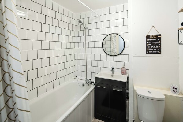 Hair dryer, towels, soap, shampoo