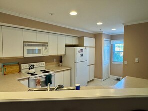 Fridge, microwave, oven, stovetop - Mike and Lee's relaxing 2-bedroom lakefront condo at Ozark Mountain Resort. (Kimberling City)