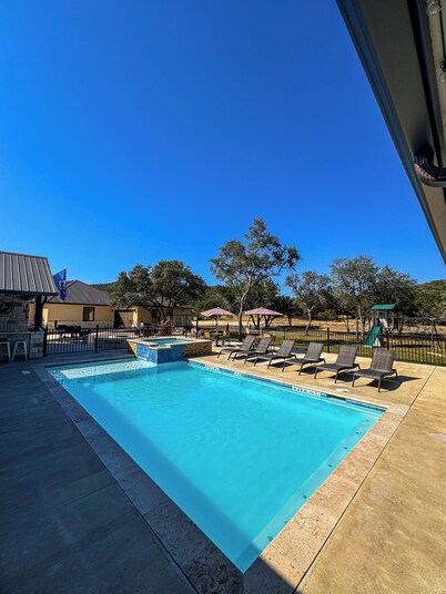 NOLA styled 6-bedroom home in Concan.  Sleeps 36 with AC, WiFi, Pool, Hot Tub