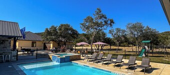 NOLA styled 6-bedroom home in Concan. Sleeps 36 with AC, WiFi, Pool, Hot Tub