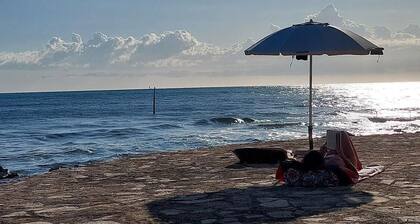 Tranquil studio flat just 50 metres from the beach with private terrace