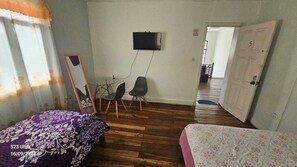 Economy Quadruple Room | In-room safe, laptop workspace, free WiFi