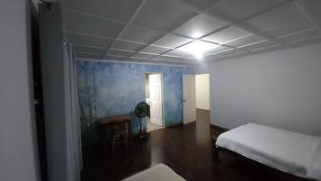 Basic Quadruple Room | Soundproofing, free WiFi, bed sheets