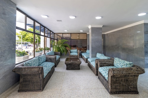 Hotel Axis Inn By GEH Suites