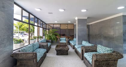 Hotel Axis Inn By GEH Suites