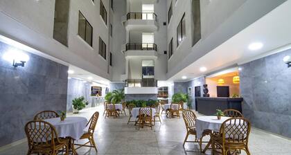 Hotel Axis Inn By GEH Suites
