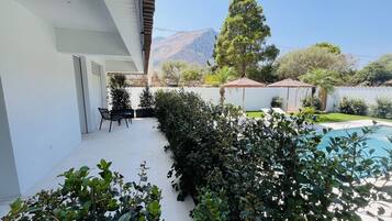 Exclusive Room, Pool View | Terrace/patio