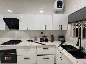 Apartment | Private kitchen | Fridge, microwave, oven, stovetop
