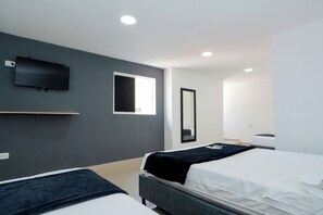 Habitación cuádruple, varias camas