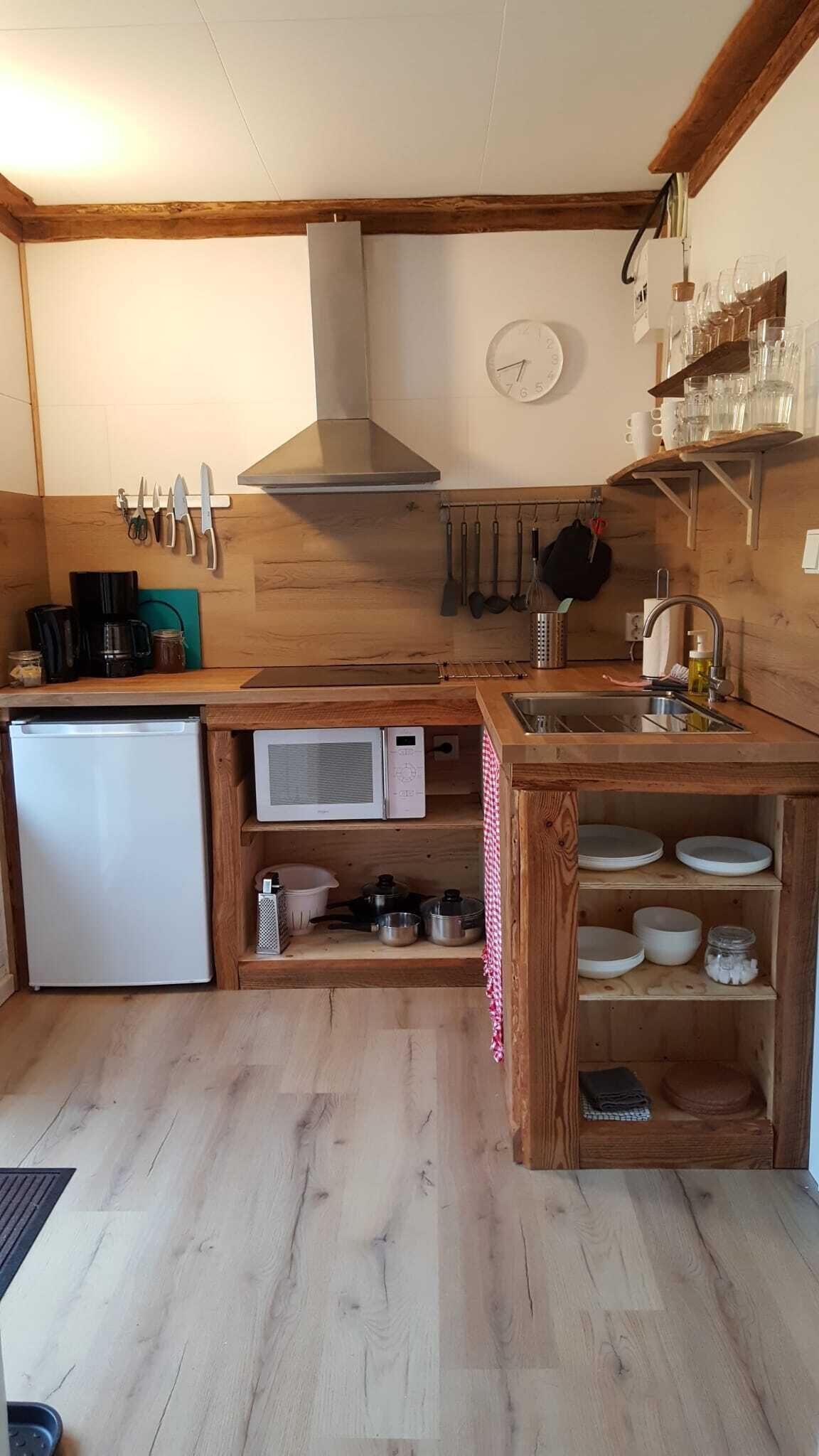 Fridge, microwave, stovetop, coffee/tea maker