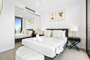 2 chambres, coffres-forts dans les chambres, fer et planche à repasser