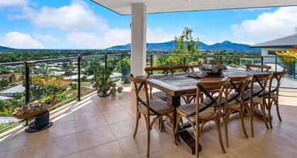 Your Ultimate Escape in Mooroobool- Luxury Tropical Retreat with Pool & Stunning Views – Perfect for Families & Groups!