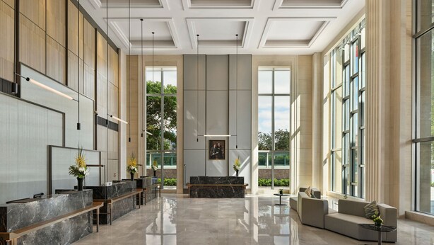 A spacious lobby with a reception desk, seating area, and large windows. - Shanghai Marriott Hotel Yangpu Riverside (Shanghai)