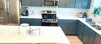 Stunning 4-BR Townhome – Family-Friendly, Biking Trails, Pool, and Games!