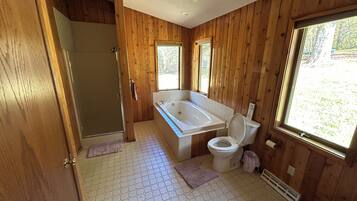 Shower, jetted bath, hair dryer, towels