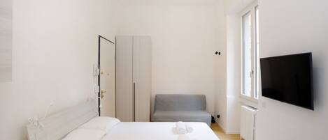 1 habitación, tabla de planchar con plancha, wifi y ropa de cama