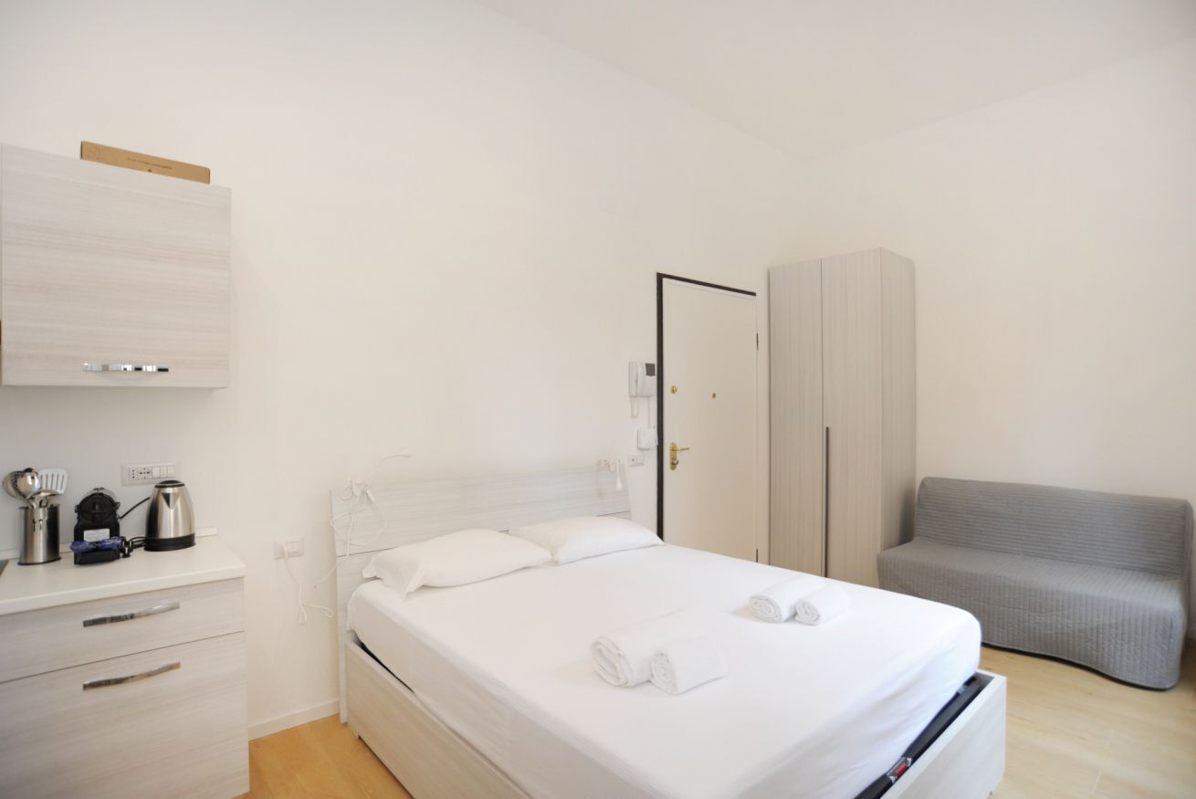 1 habitación, tabla de planchar con plancha, wifi y ropa de cama 