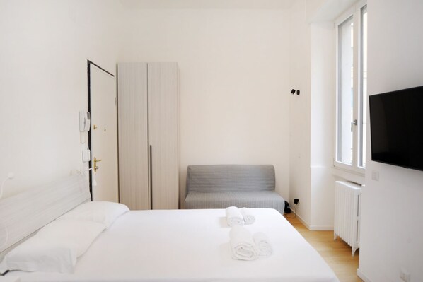 1 habitación, tabla de planchar con plancha, wifi y ropa de cama 