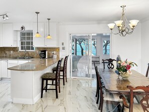 Fridge, microwave, oven, stovetop - Baywatch Paradice Paradice  8 m to beach, private pier, Sleeps 8 Fenced Dog Area (Gulf Shores)