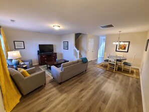 Living area - Comfy townhouse near airport and dining! (Greensboro)