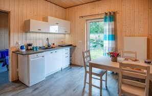 Fridge, stovetop, dishwasher, coffee/tea maker