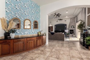 Smart TV, fireplace, ping pong, books