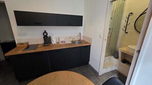 Microwave, coffee/tea maker, cookware/dishes/utensils