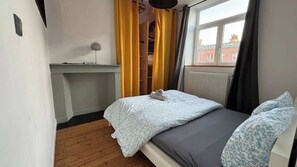2 slaapkamers, een strijkplank/strijkijzer, reisbedje, wifi