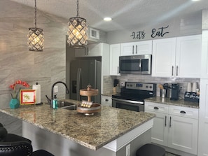 Fridge, microwave, oven, stovetop - Luxe King Suite Bliss Getaway Condo Near Disney  (Kissimmee)